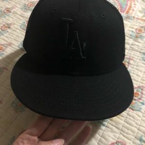 All black fitted LA hat size 7